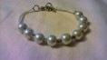 Bracciale composto da perle-perline                        5 Euro