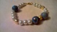 Bracciale composto da perle-pietre-swarovski            8 Euro