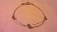 Bracciale composto da acciao con zirconi          4 Euro