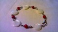 Bracciale composto da madre perla-corollo                    8 Euro