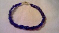 Bracciale intrecciato con perline     5 Euro